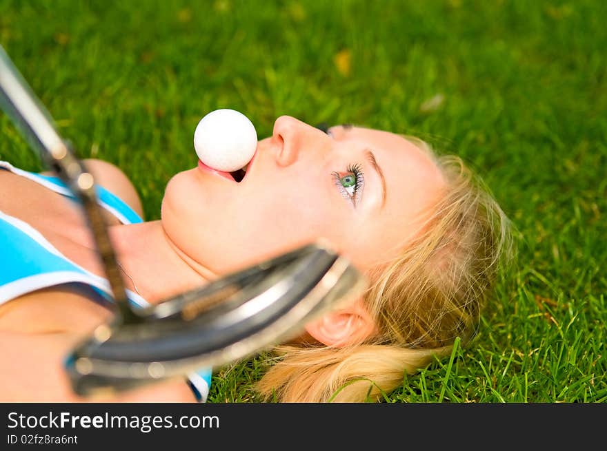 Young woman with ball on the grass. Young woman with ball on the grass