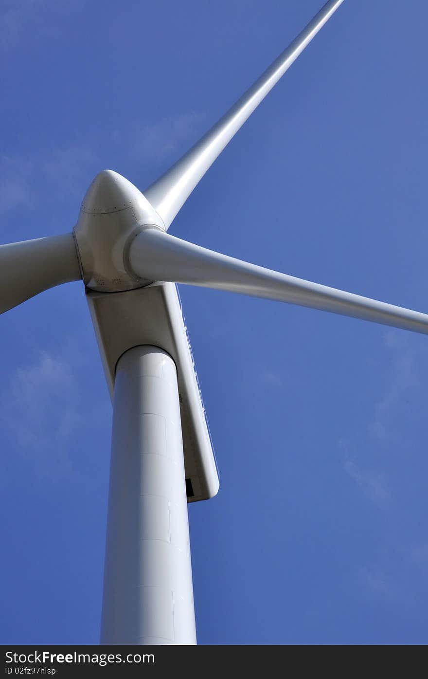 Wind turbine on the clear sky