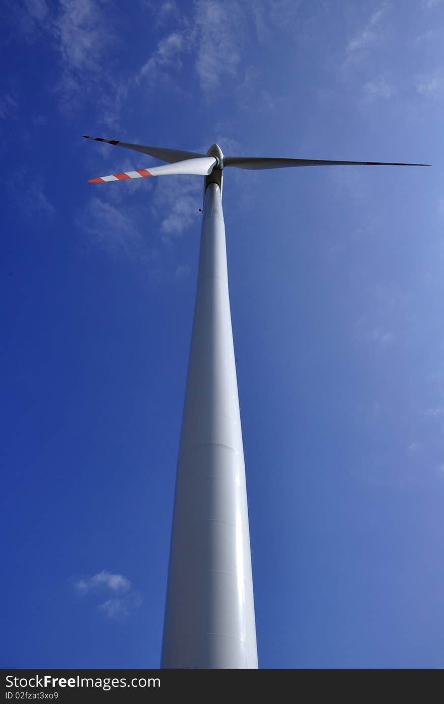 Wind turbine on sunny day