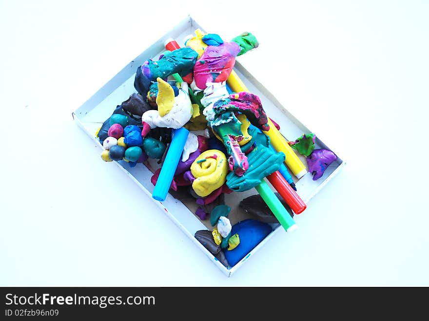 Figures stuck together from plasticine the small child. Figures stuck together from plasticine the small child