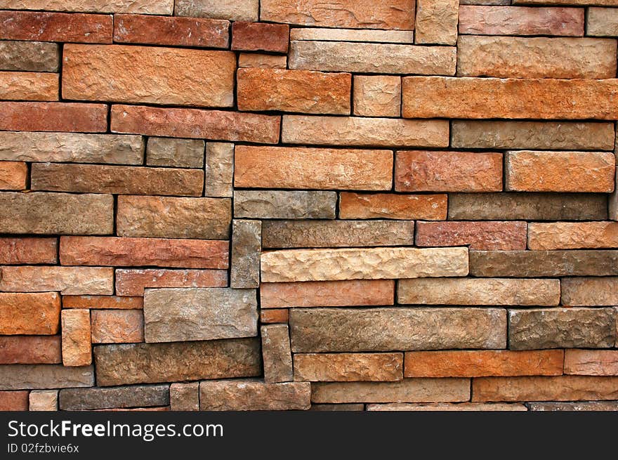 Background texture of wall with uneven sized bricks. Background texture of wall with uneven sized bricks