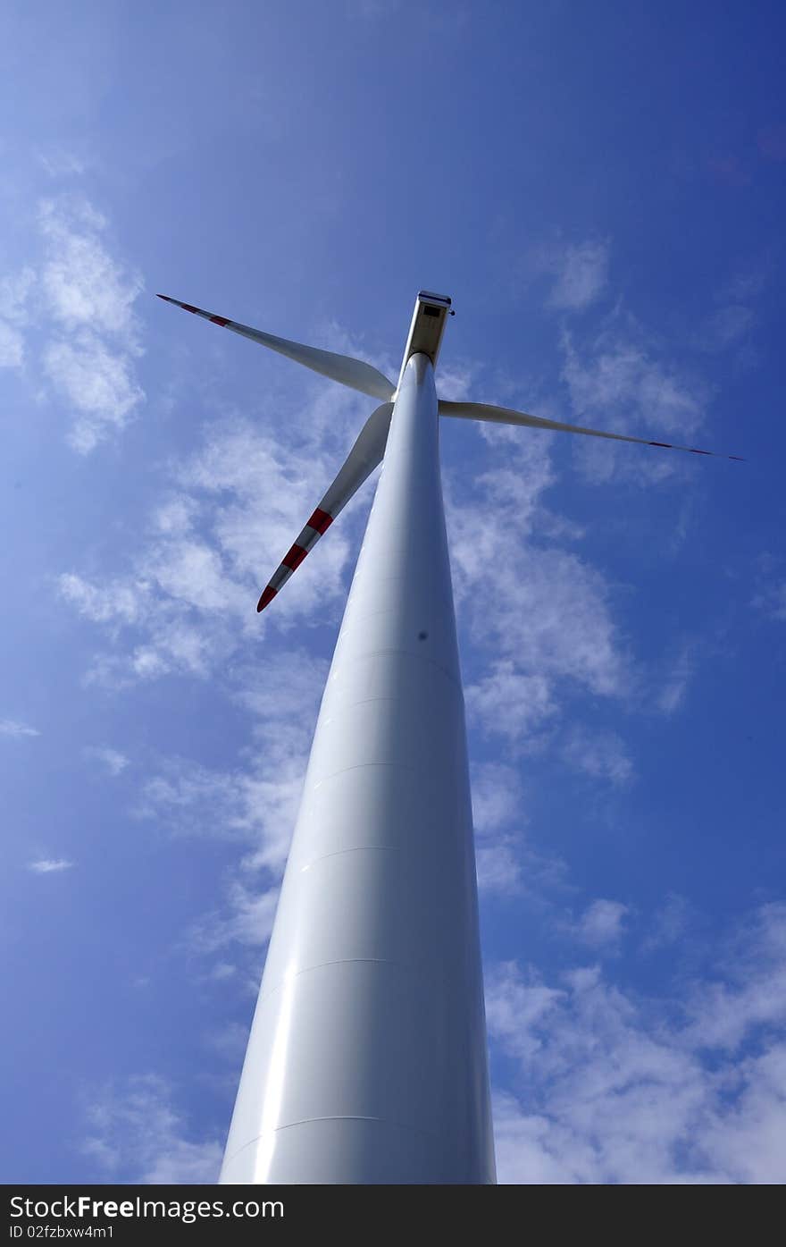 Wind turbine on sunny day