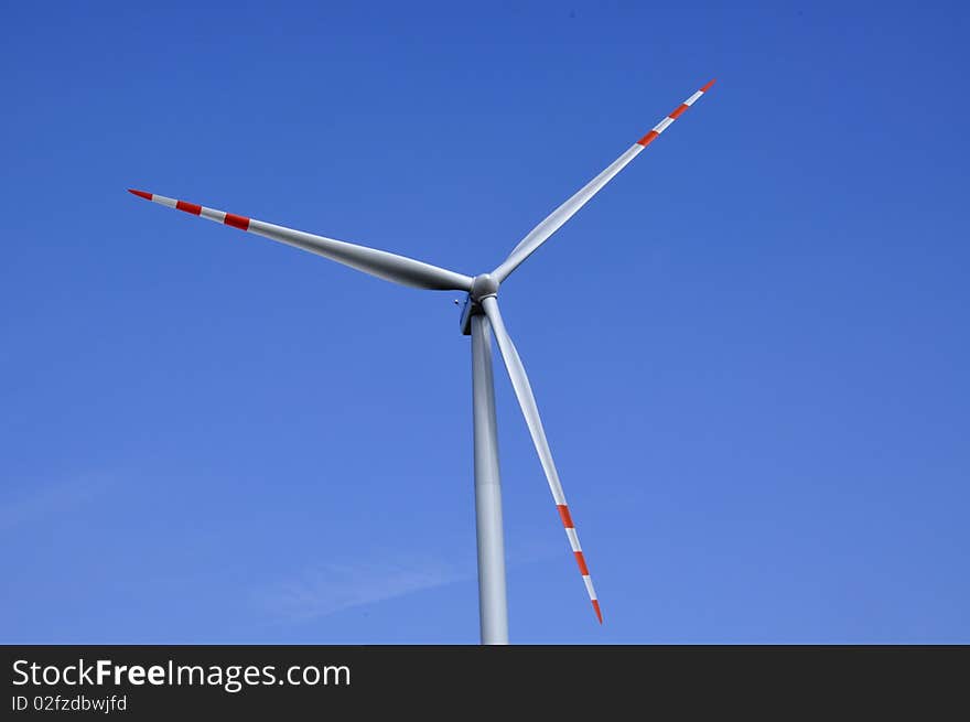 Wind turbine on sunny day