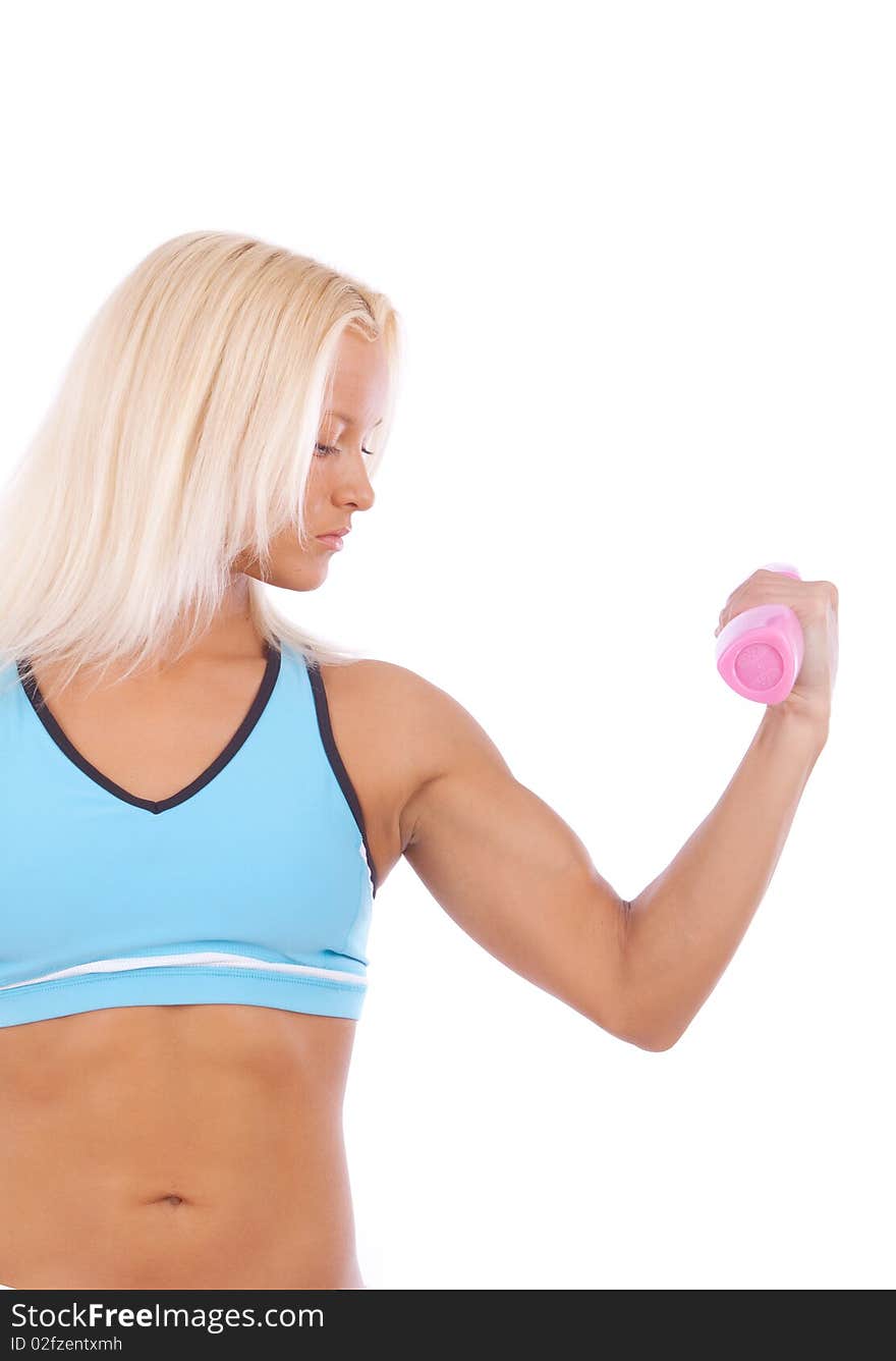 Woman holding pink dumbbells