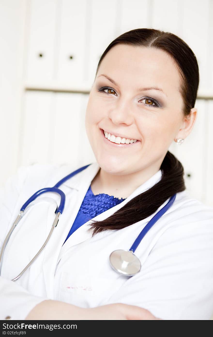 Doctor Woman With Stethoscope In Office