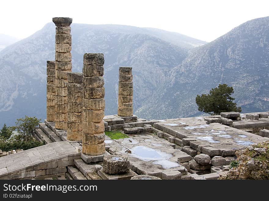 The ruins of Temple of Apollo in the archaeological site of Delphi in Greece; Delphi was believed to be the centre of the earth. The ruins of Temple of Apollo in the archaeological site of Delphi in Greece; Delphi was believed to be the centre of the earth