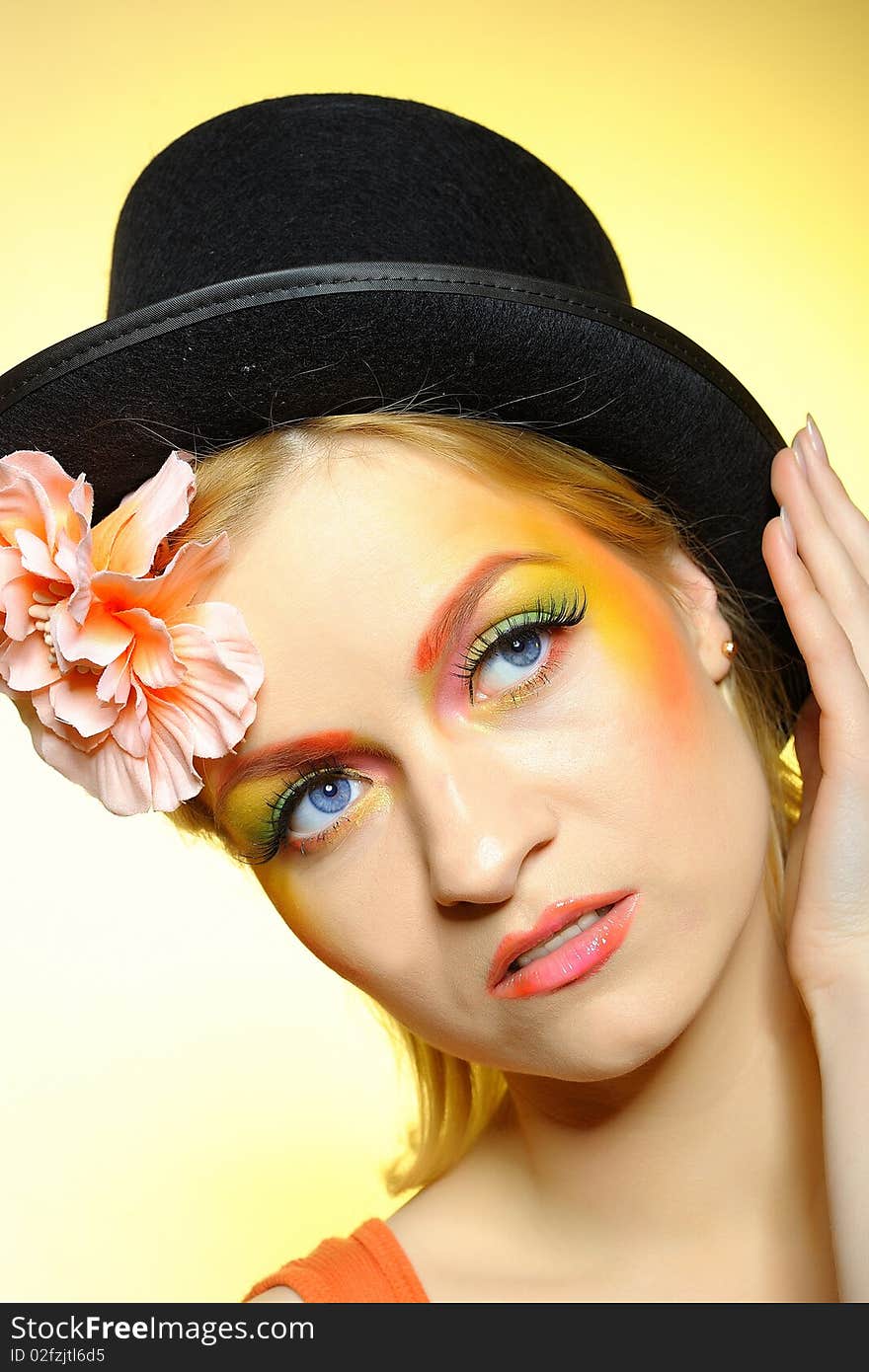 Fashion woman with creative eye make-up