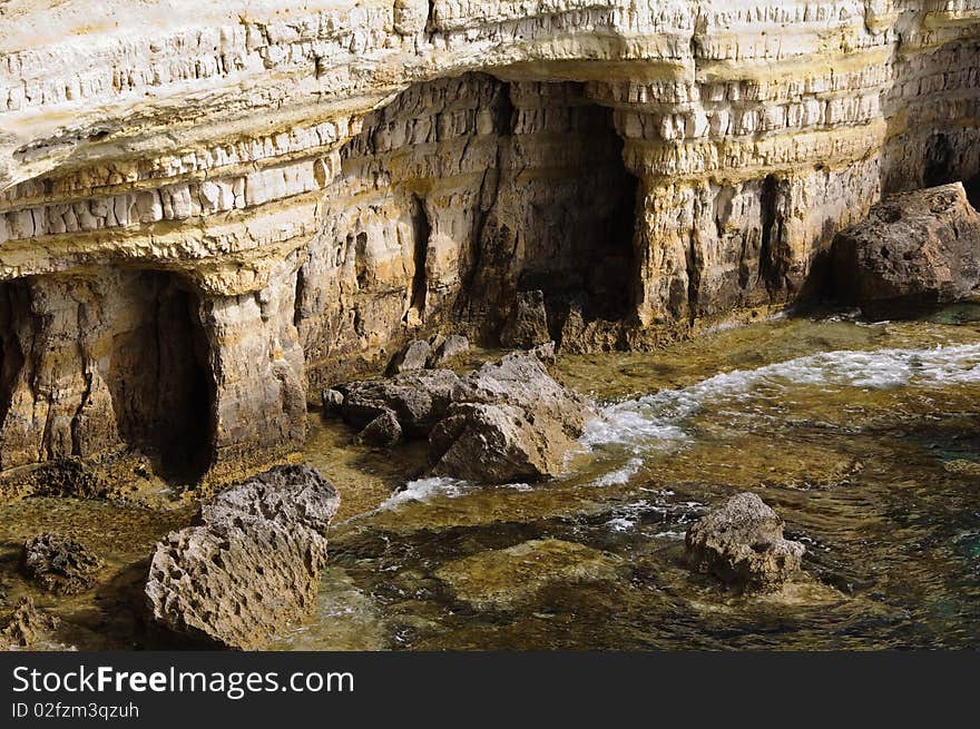 Sea caves near Cape Greko. Mediterranean Sea.