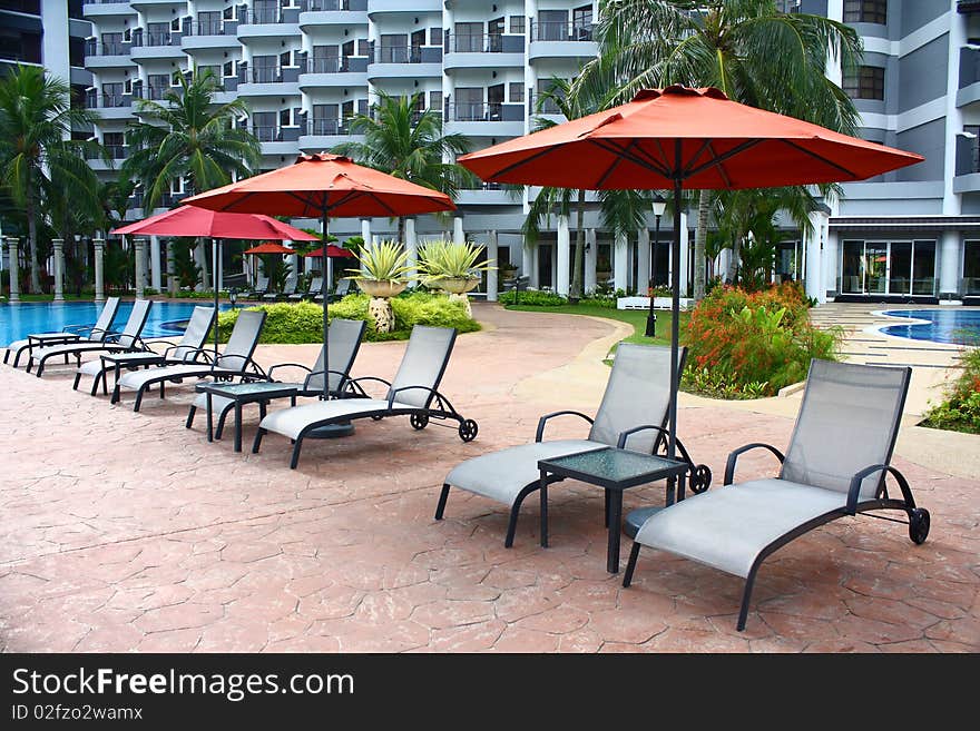 An image showing poolside deckchair for swimmer to relax. An image showing poolside deckchair for swimmer to relax