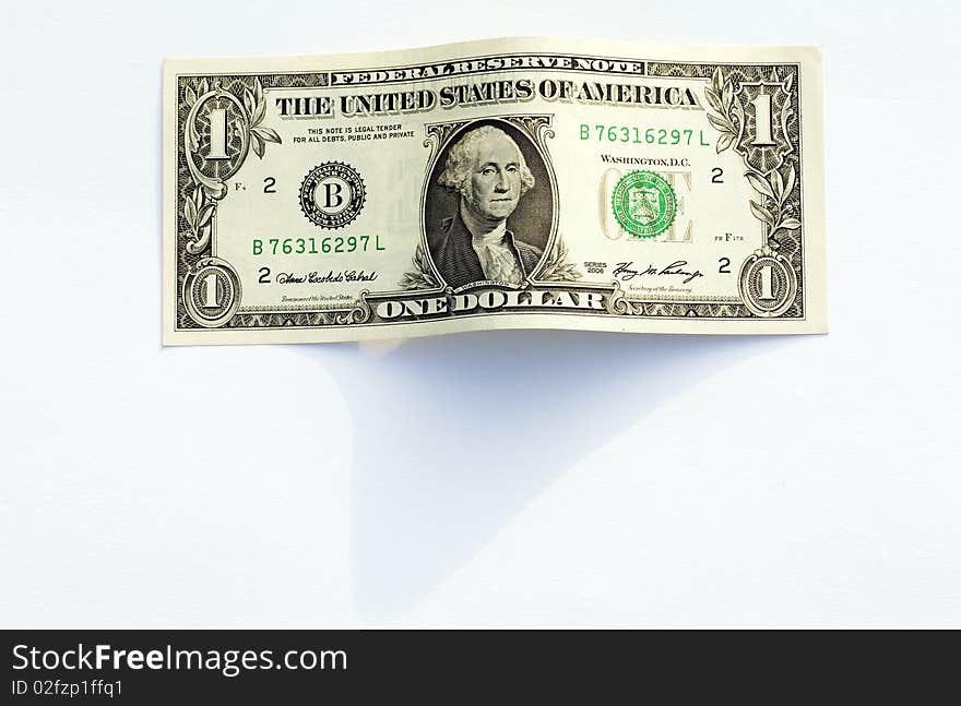 One dollar usa photographed on a light background. One dollar usa photographed on a light background