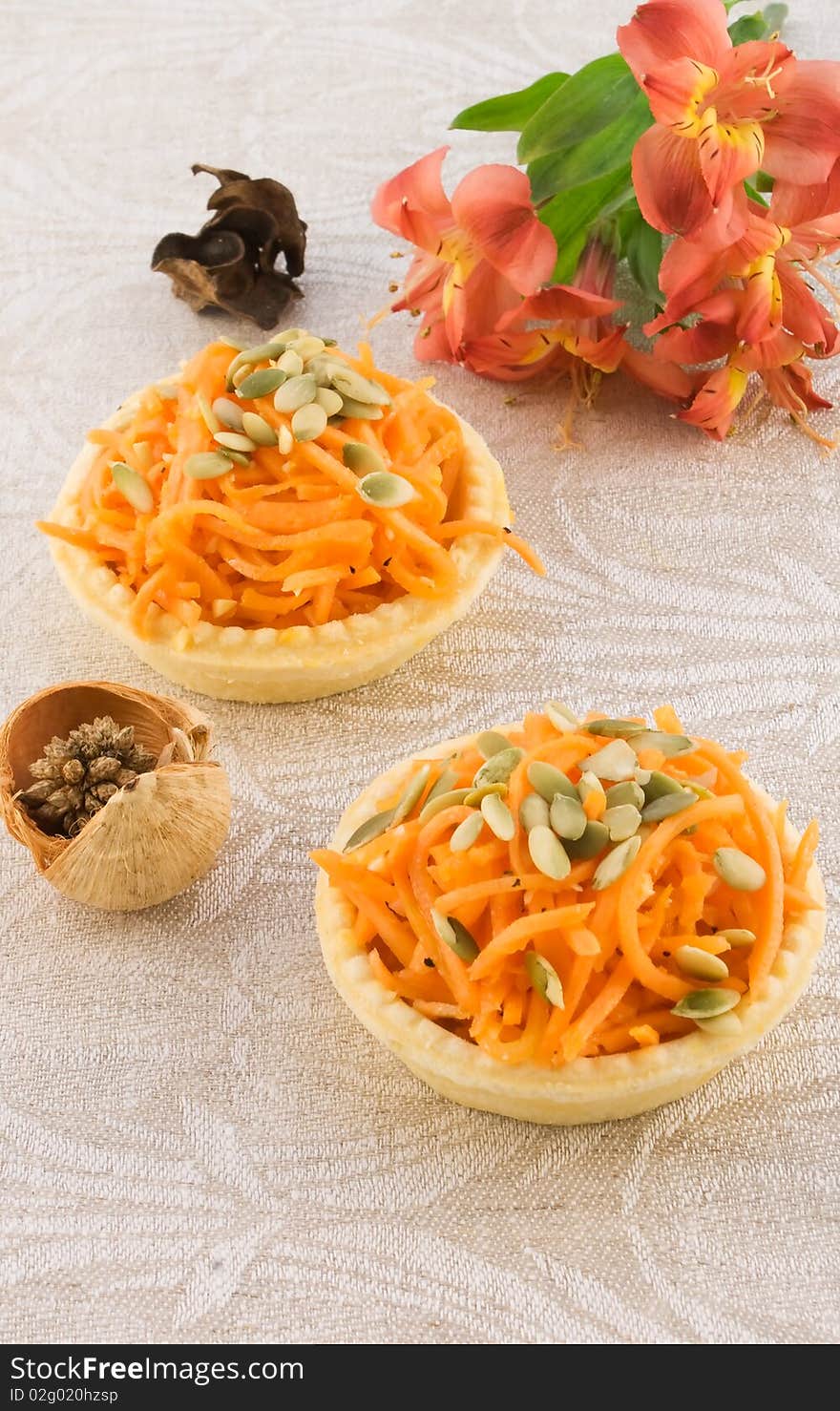 Carrot salad in a basket with flower