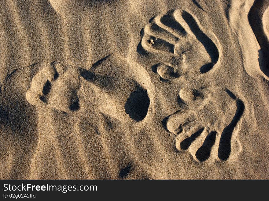 An image of footprint on sand