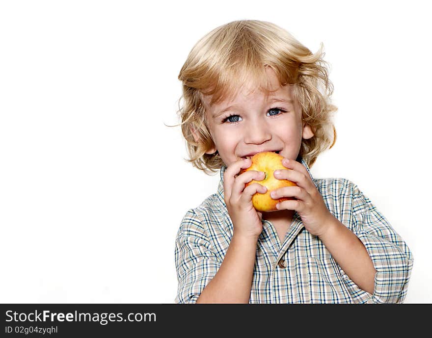 Portrait of the little boy on a light background