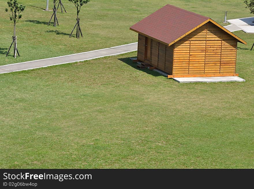 A woody house built beside the bicycle path. A woody house built beside the bicycle path