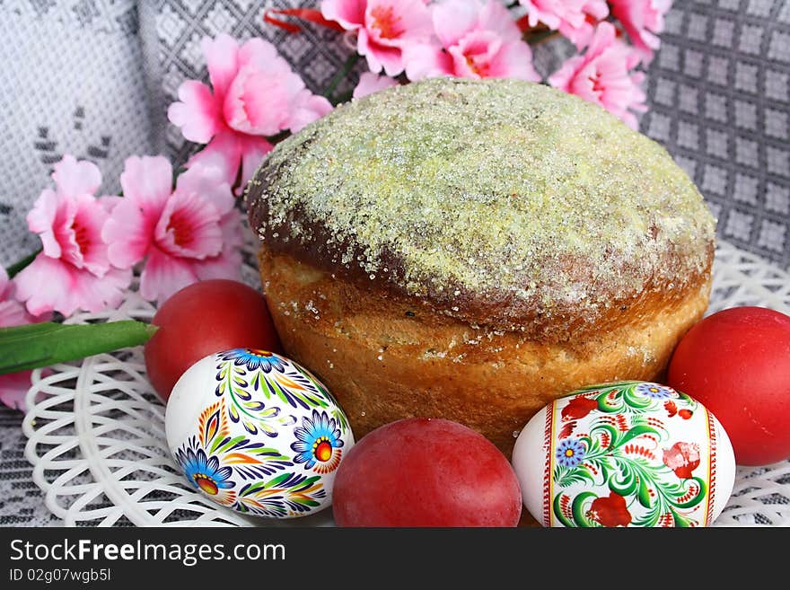 Traditional othodox easter pie with eggs on a ornamental cloth. Traditional othodox easter pie with eggs on a ornamental cloth