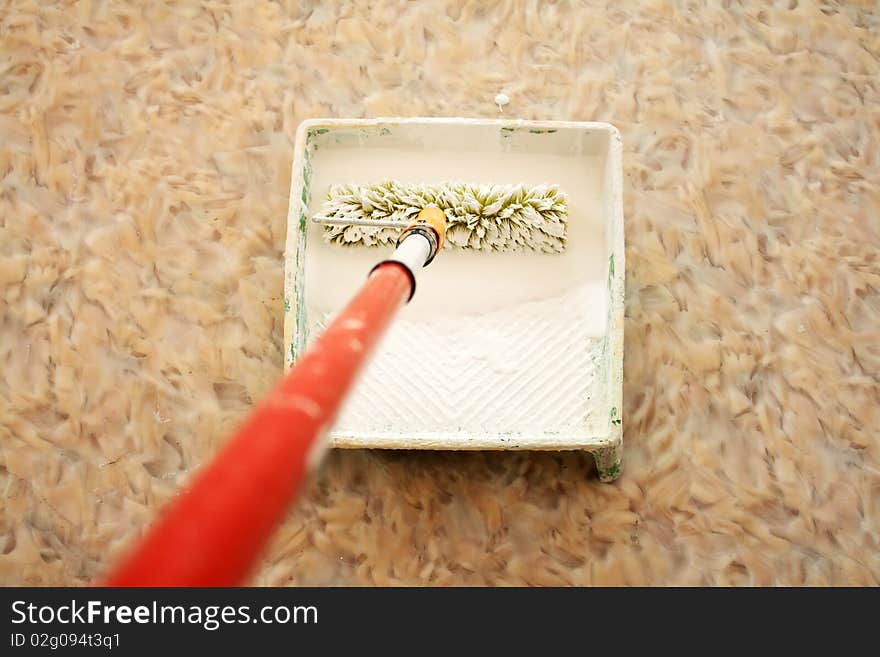 Tray with paint and roller. Tray with paint and roller