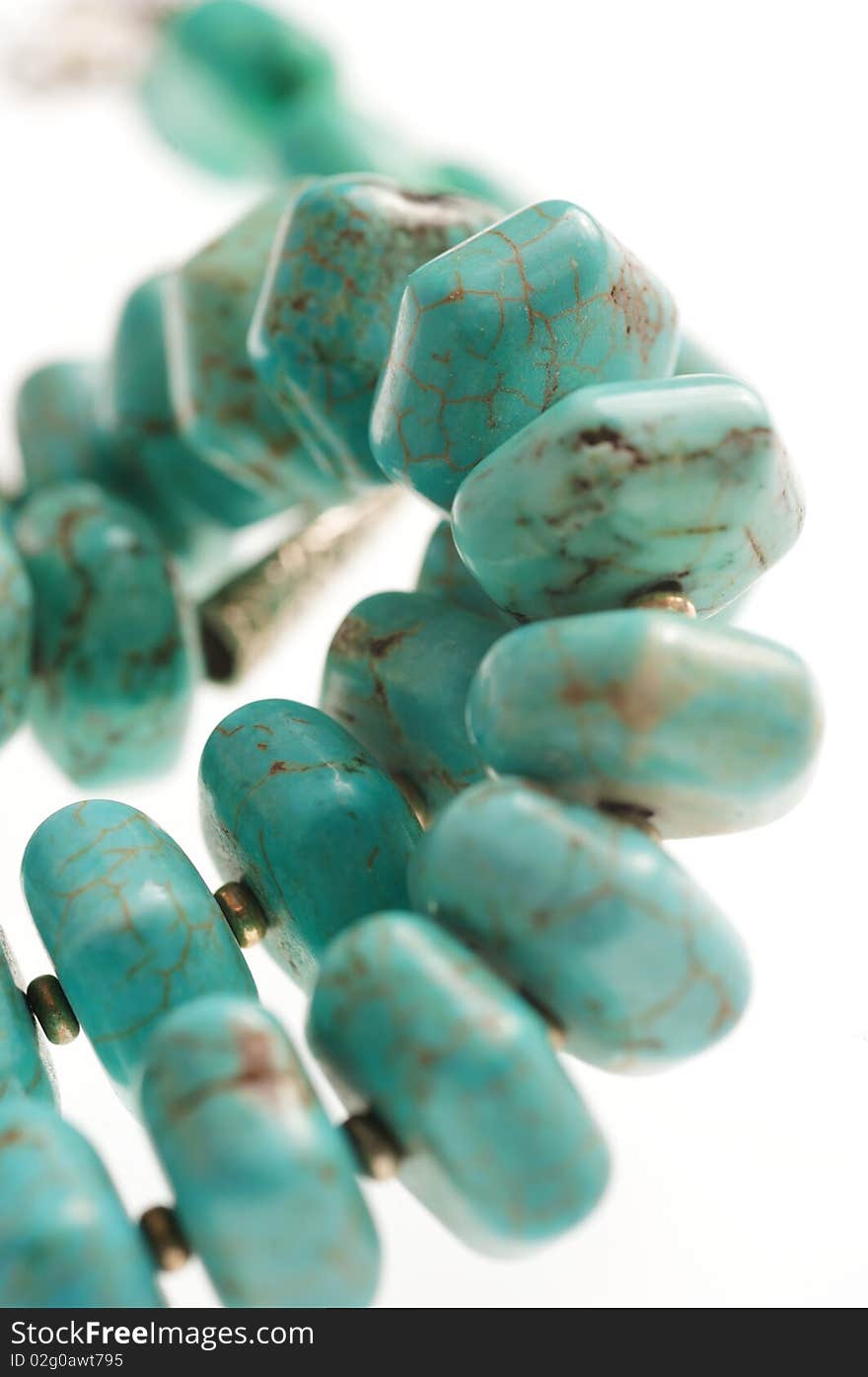 Beads with natural stone turquoise close-up. Beads with natural stone turquoise close-up