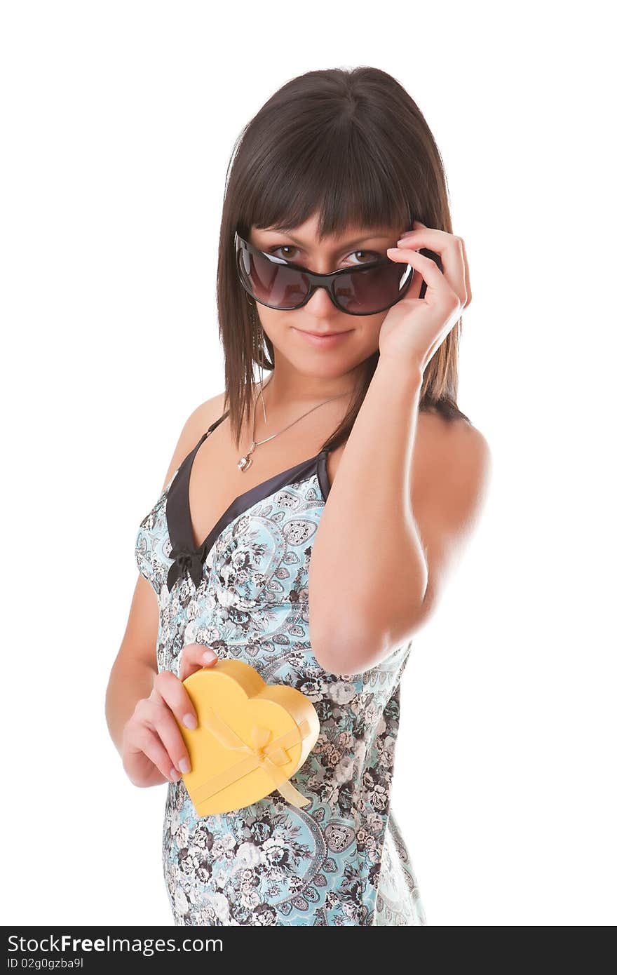 Girl with a gift isolated on a white background. Girl with a gift isolated on a white background