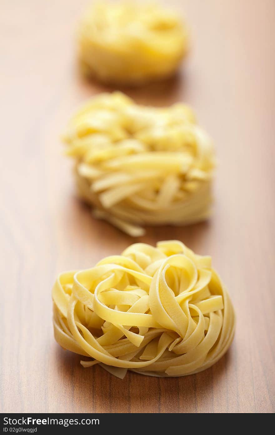 Raw pasta tagliatelle