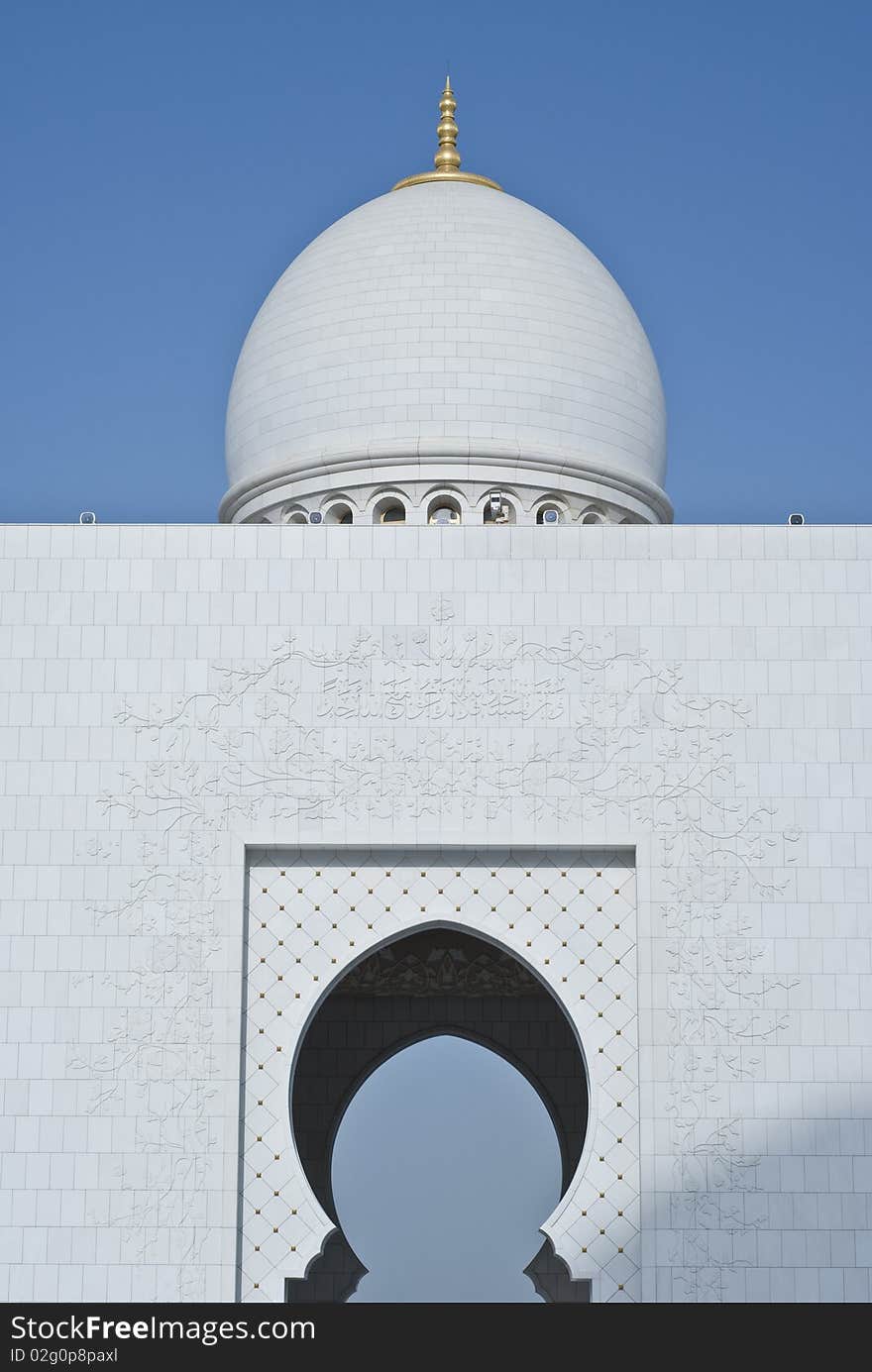 A detail of the door and archway at a mosque. A detail of the door and archway at a mosque