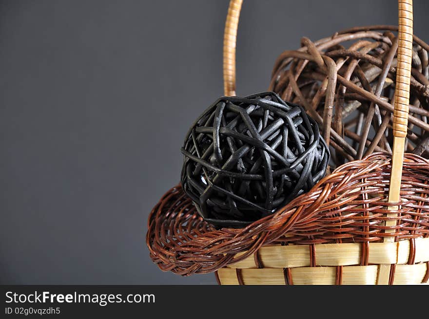 Wicker handmade basket and spheres