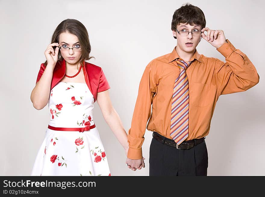 Young pretty wife and husband in studio. Young pretty wife and husband in studio