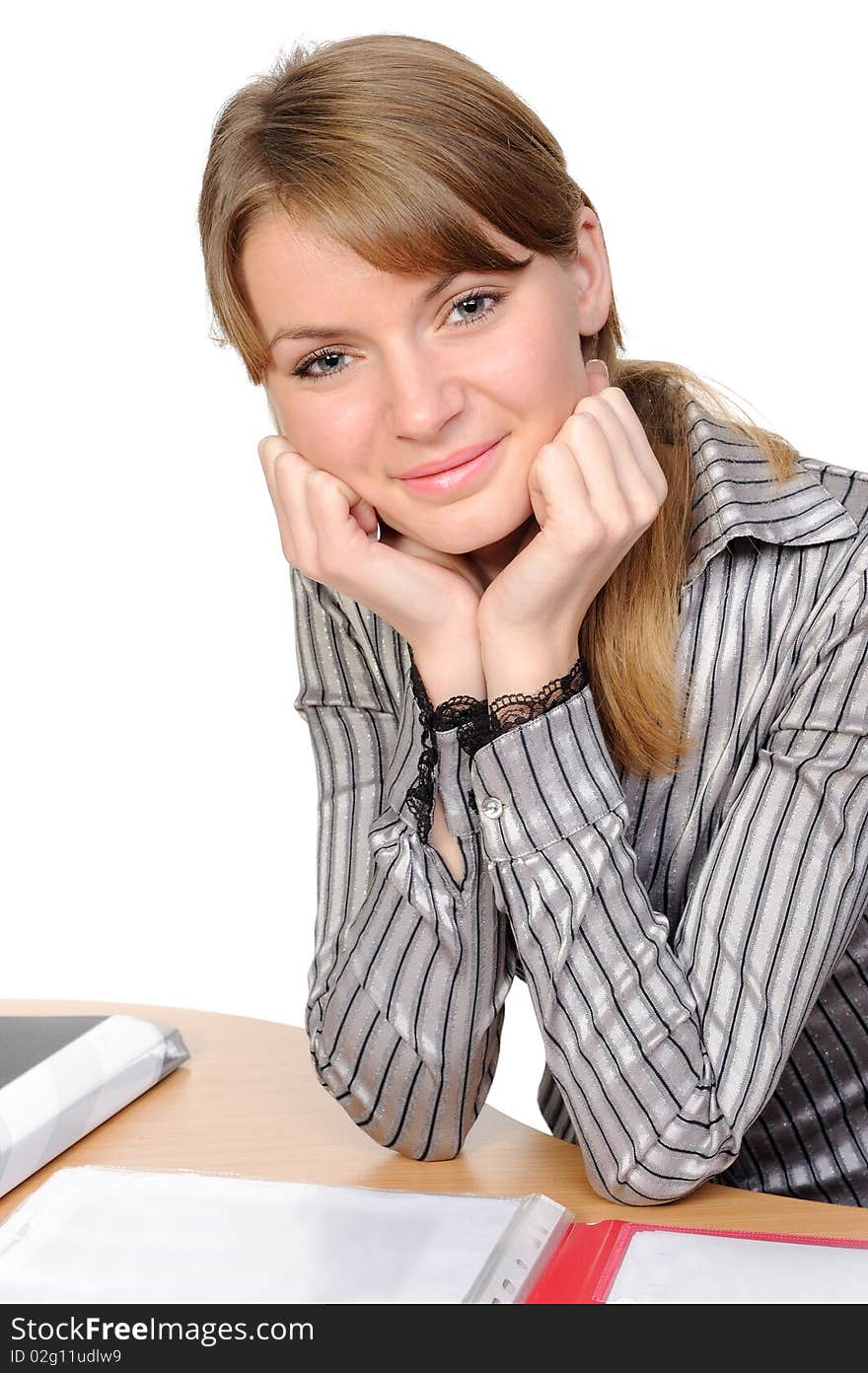 Portrait of business woman with a folder, smiling on a white background