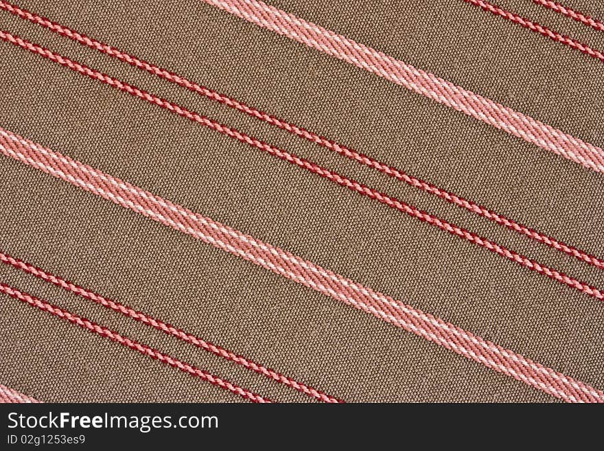 A closeup of a diagonal striped fabric background