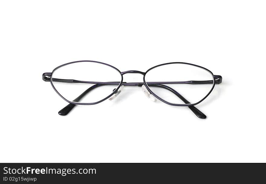 Eyeglasses closeup on a white background with reflection