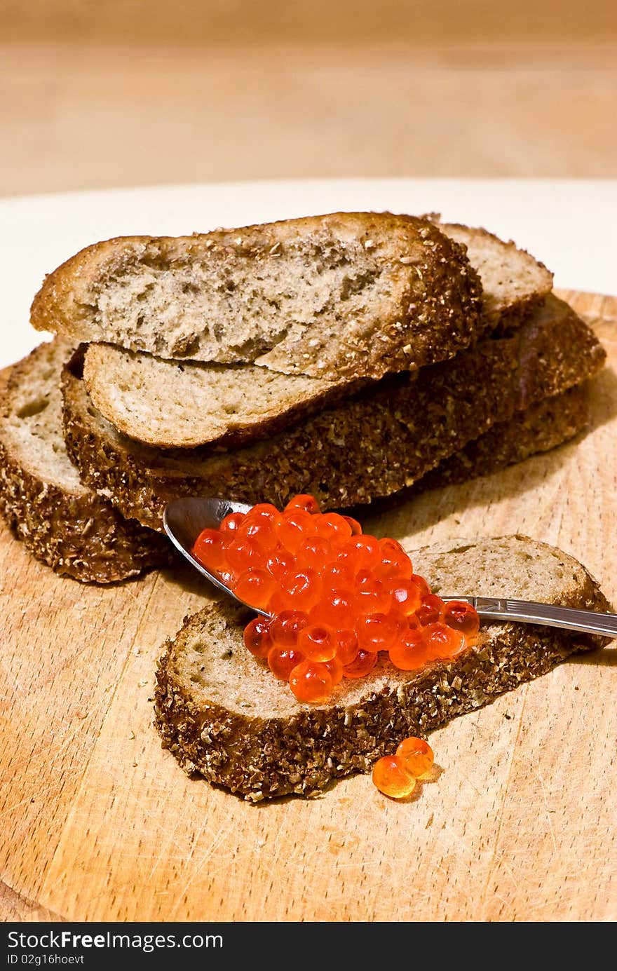 Red caviar wuth slice of bread