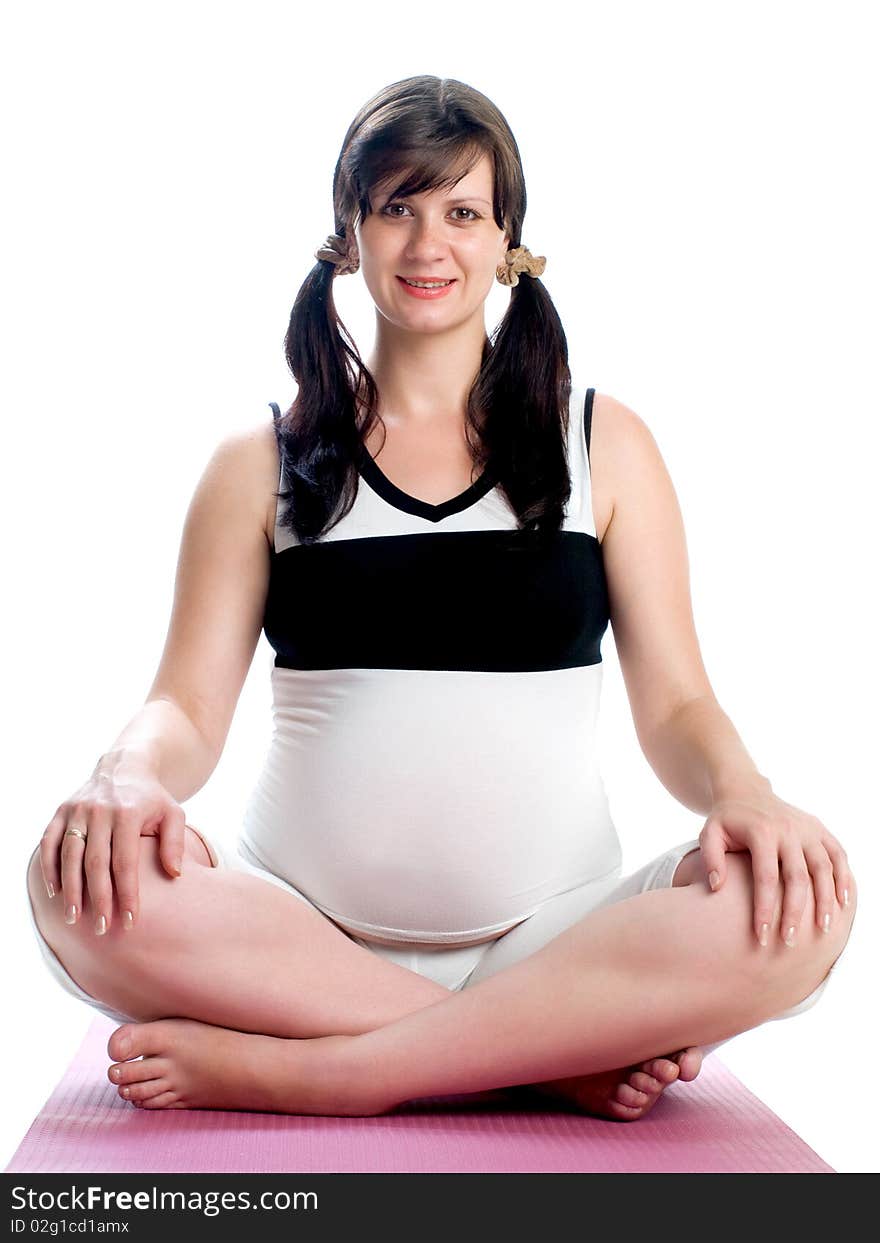 A shot of a beautiful pregnant woman practicing yoga