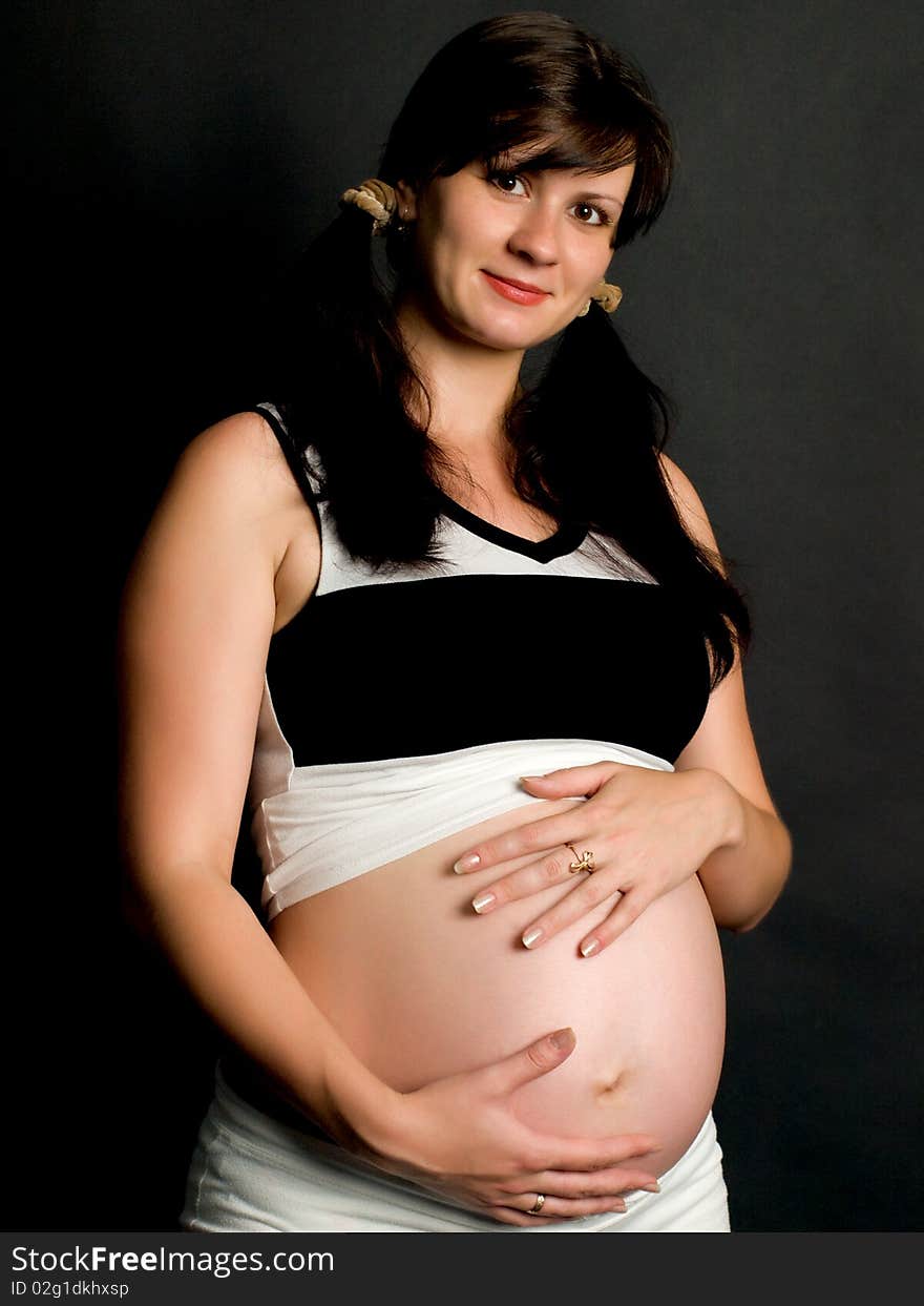 A shot of a beautiful pregnant woman