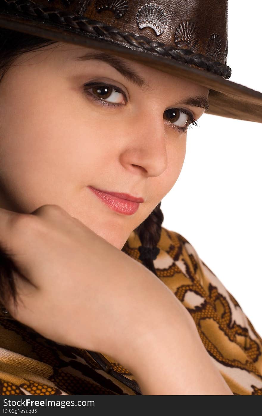 Beautiful young caucasian girl in a cowboy hat over white background. Beautiful young caucasian girl in a cowboy hat over white background