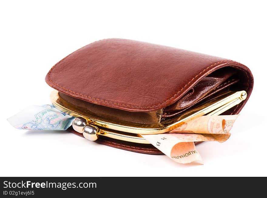 Old purse and coins against white background