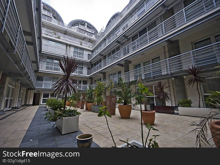 Modern multi level building with atrium and plants