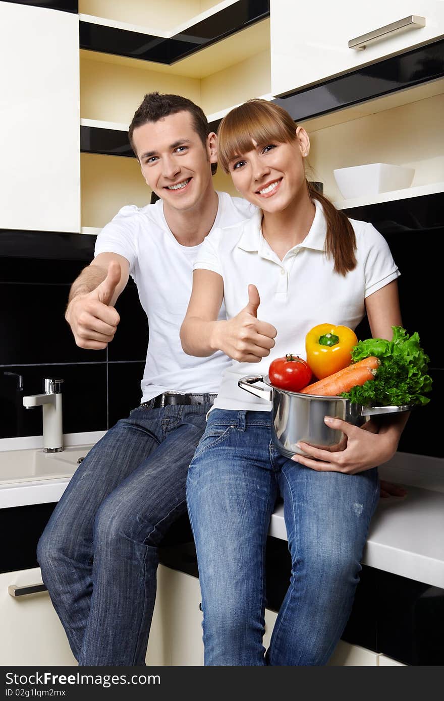 Smiling couple on kitchen