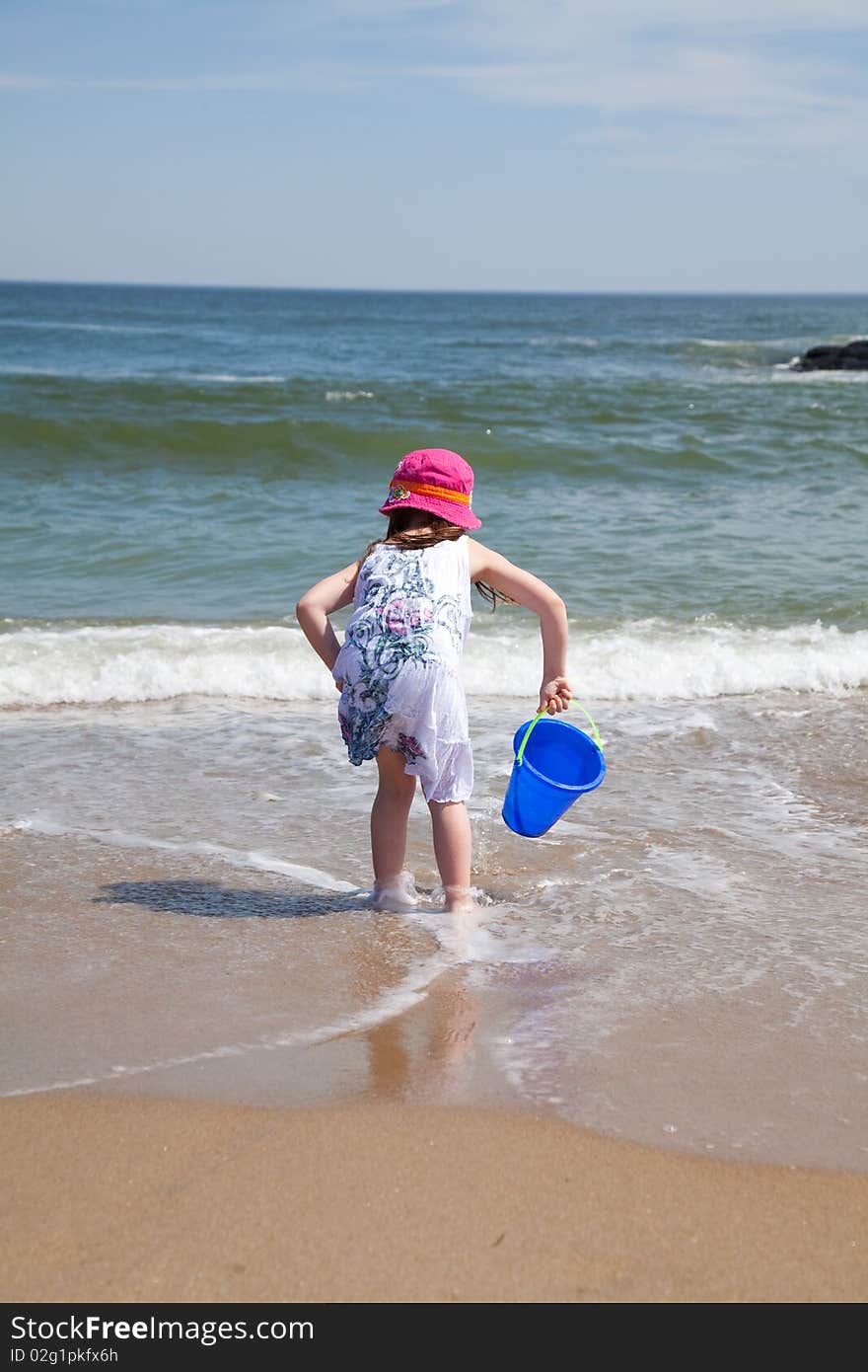 Girl playing at the beach. Girl playing at the beach