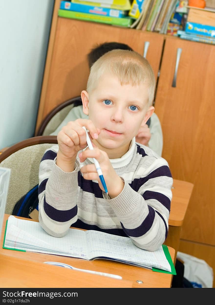 The boy at a lesson at school