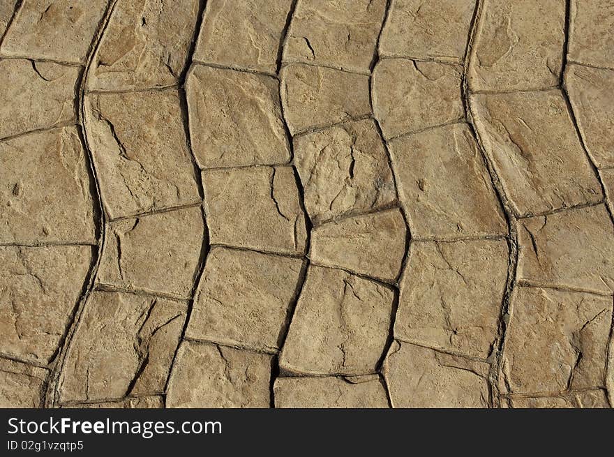 Wavy cobblestone walking path in detail and close-up, shows texture on surface