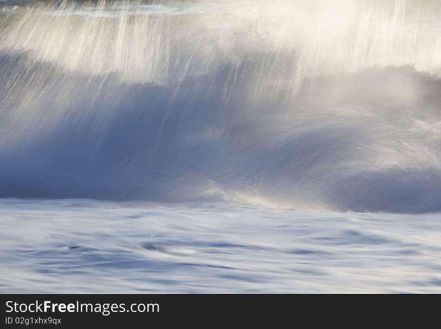 Dying waves at shore, long exposed action.