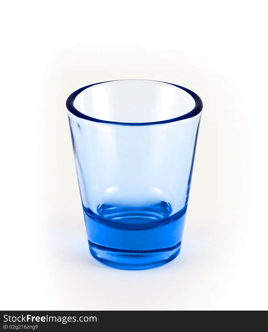 Empty blue glass on a white background