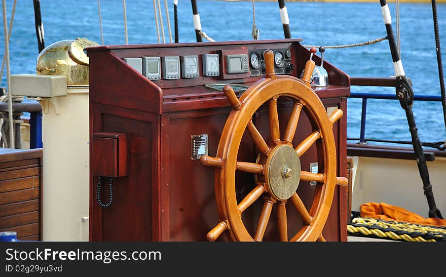 Rudder-wheel of an old wooden ship