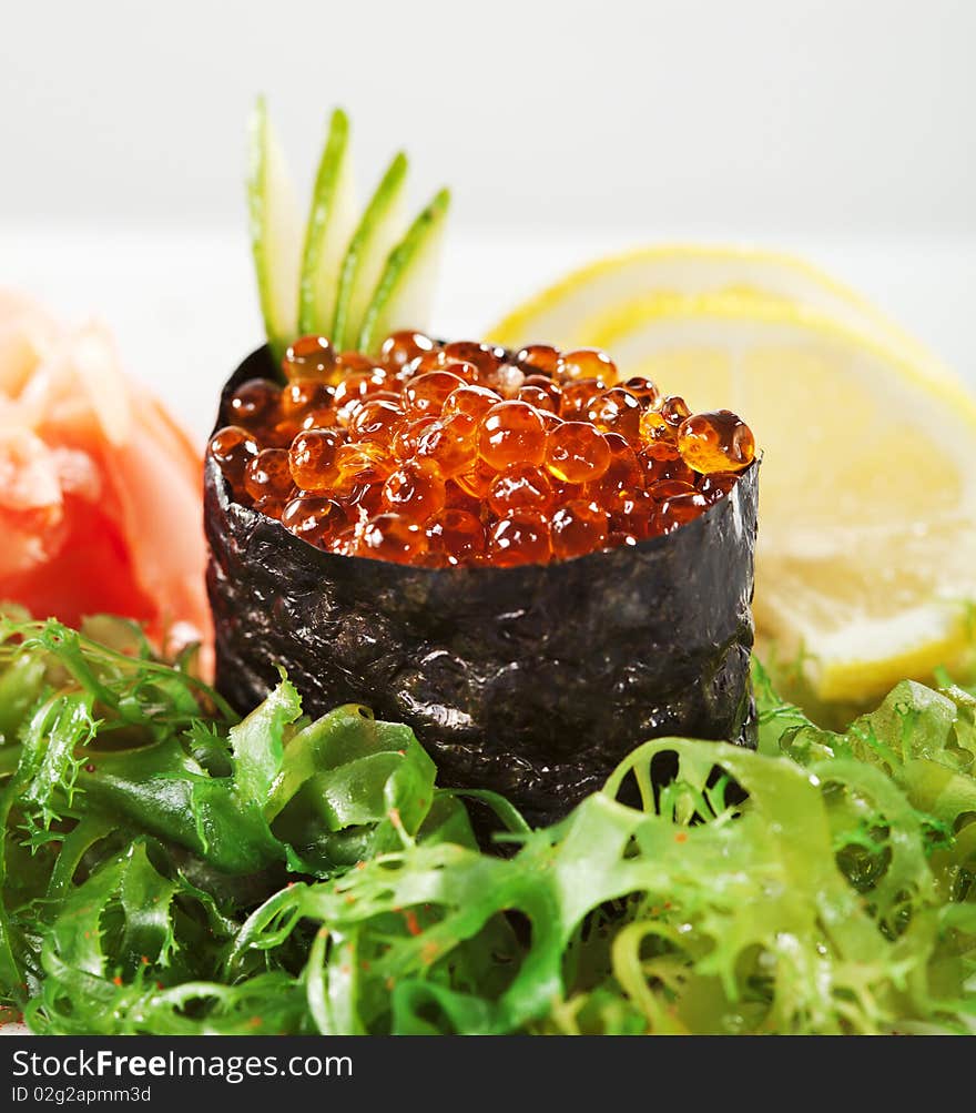 Ikura (Salmon Roe) Gunkan Maki Sushi with Cucumber. Ikura (Salmon Roe) Gunkan Maki Sushi with Cucumber