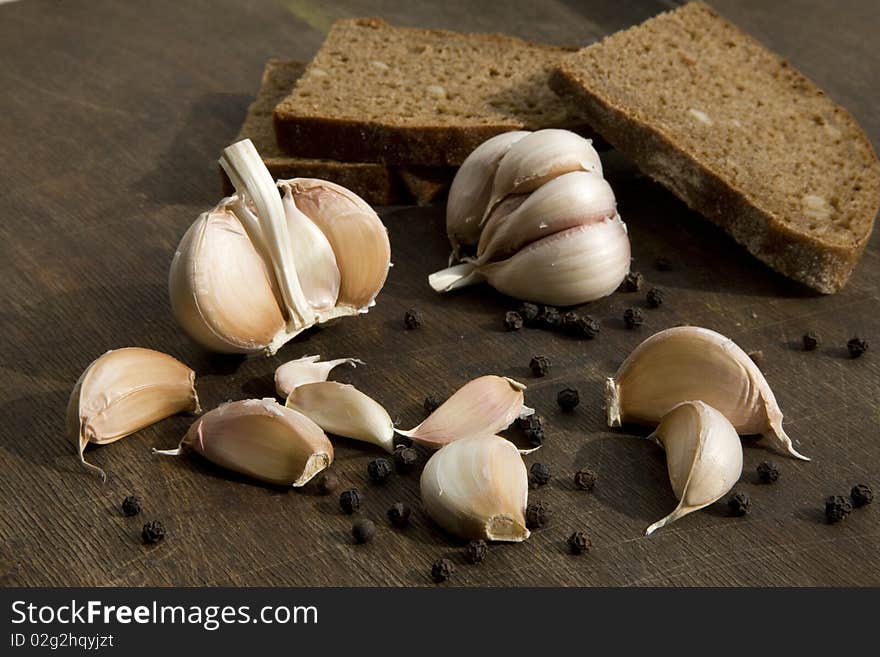 Garlic and black pepper with brown bread. Garlic and black pepper with brown bread