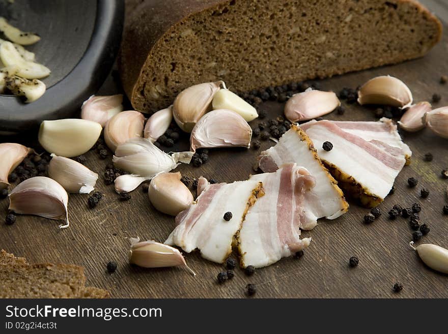 Cut pork fat with garlic pepper and brown bread russian style. Cut pork fat with garlic pepper and brown bread russian style