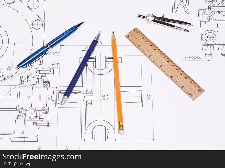 Compasses, pen and ruler at draft