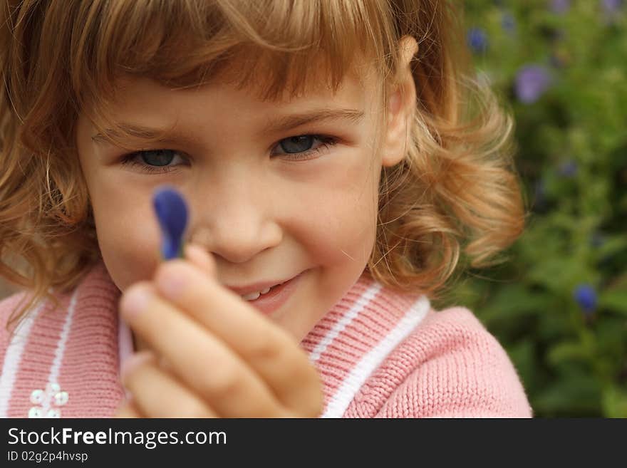 Girl Holding In Her Hand Annual Delphinium