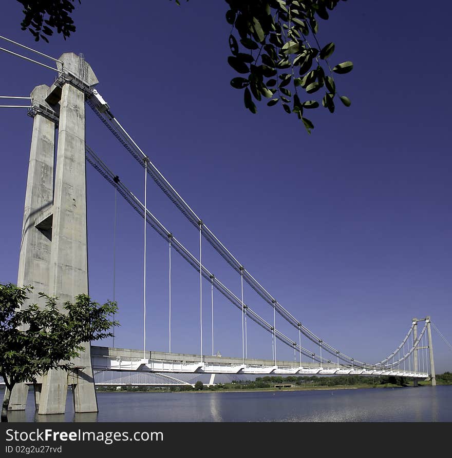 Suspension cable-stayed rail bridge crossing Putrajaya's lake, Malaysia