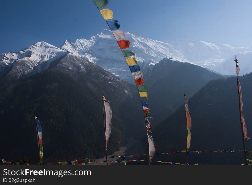 Buddist Flags In Front Of Annapurna