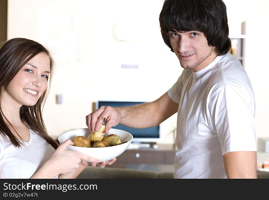 Boy and beautiful girl with smile and with plate. Boy and beautiful girl with smile and with plate